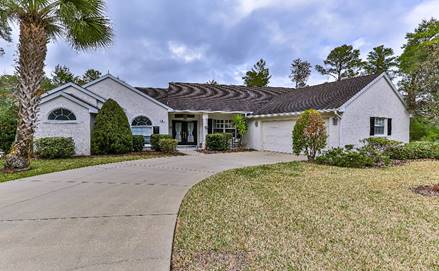 A picture containing grass, sky, outdoor, house  Description automatically generated