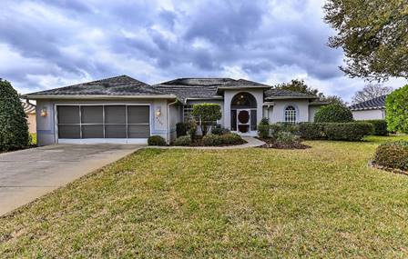 A house with a large front yard  Description automatically generated with low confidence