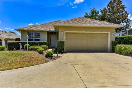 A house with a garage  Description automatically generated with medium confidence